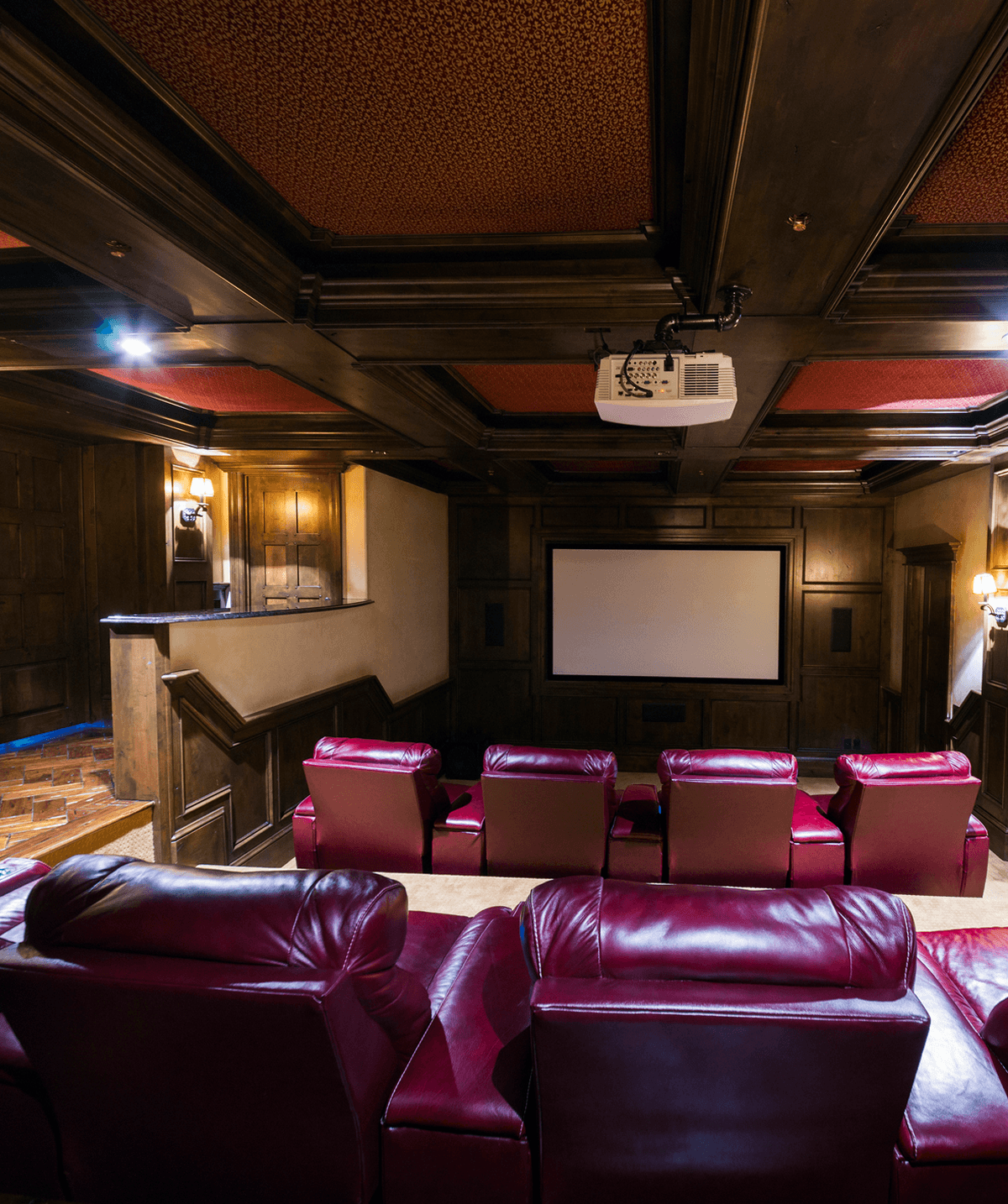 Cozy cinema room with projector screen