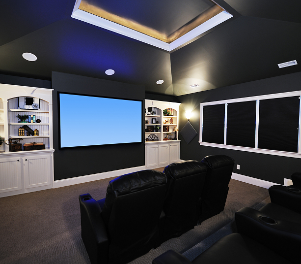 Home theater with large screen and recliners